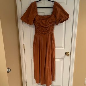 Free People “Ain’t She A Beaut” Puff Sleeve Dress in Orange/Rust